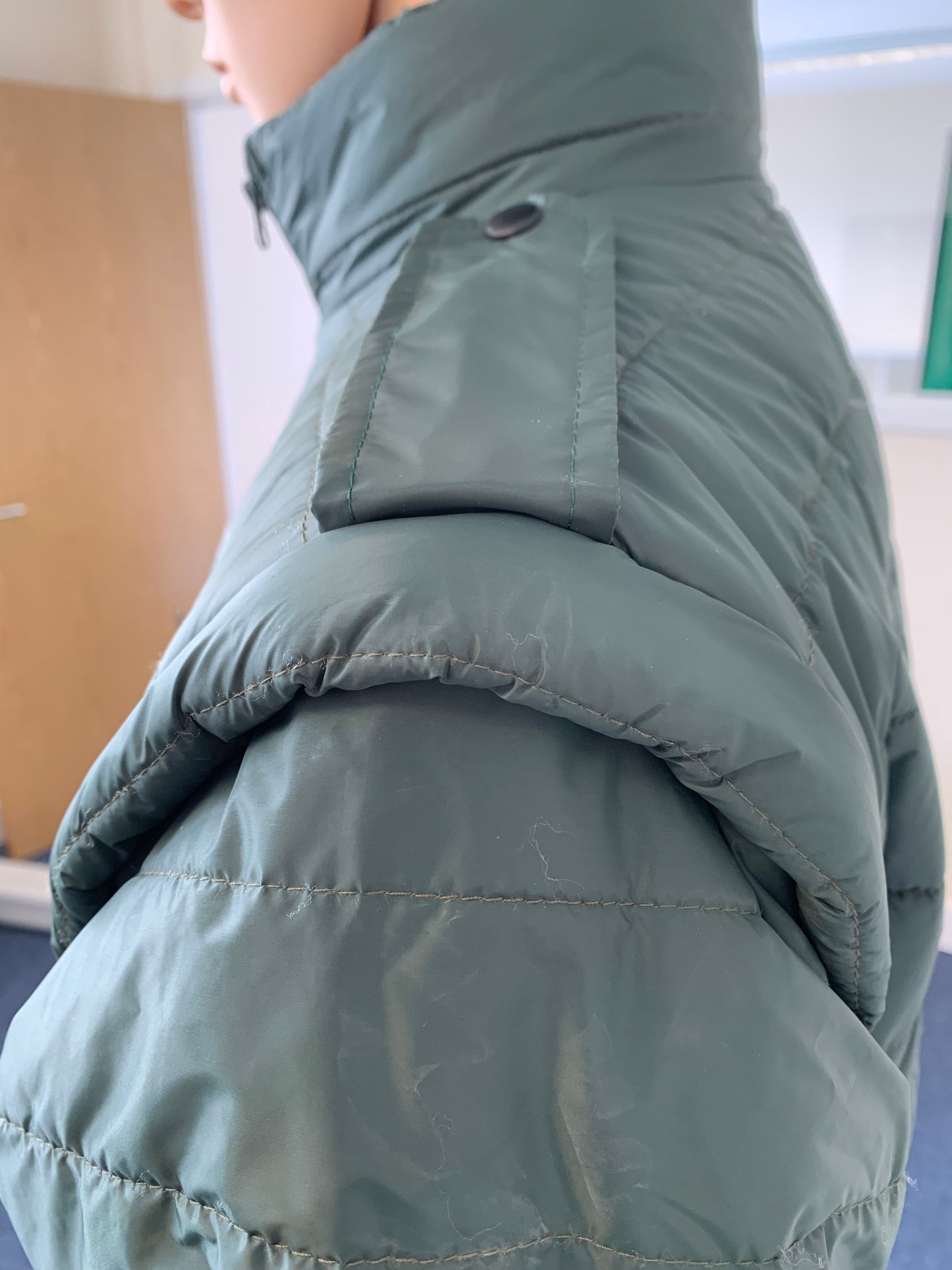 Teppi Padded jacket with removable sleeves