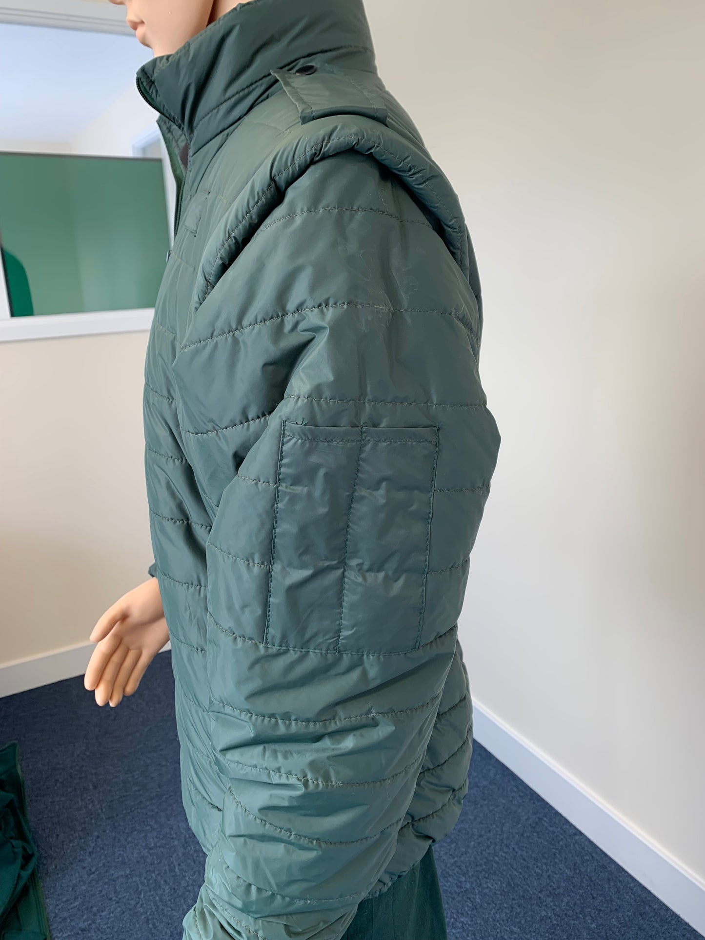 Teppi Padded jacket with removable sleeves